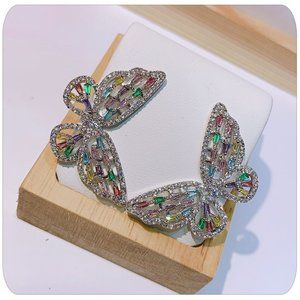 Brand new Butterfly Earrings with colorful stones.